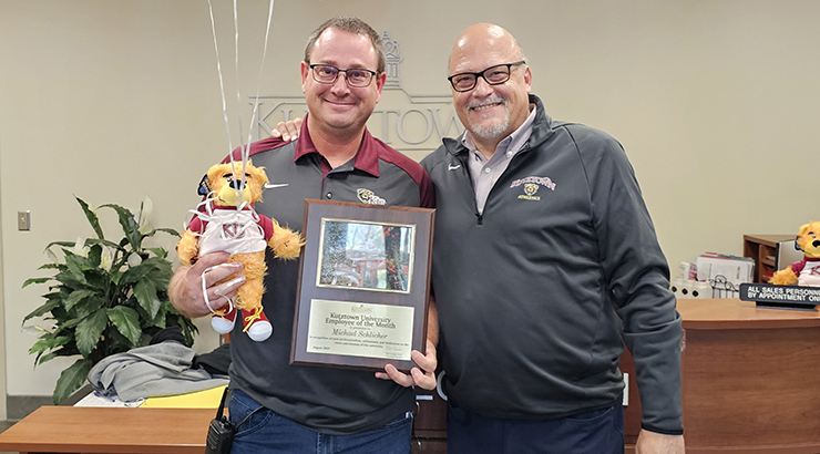 Schlicher presented awards from Cavalier