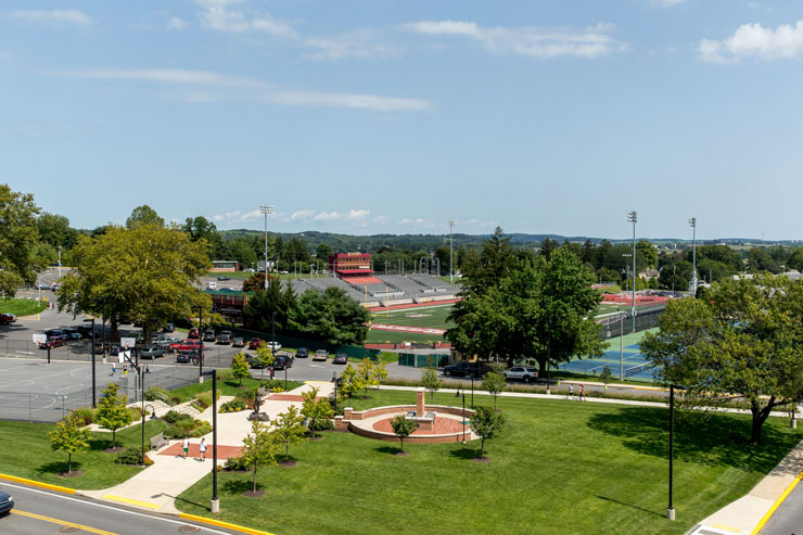 Photo of Kutztown University South Campus showing Golden Bear Plaza and parts of University Field, basketball and tennis courts.