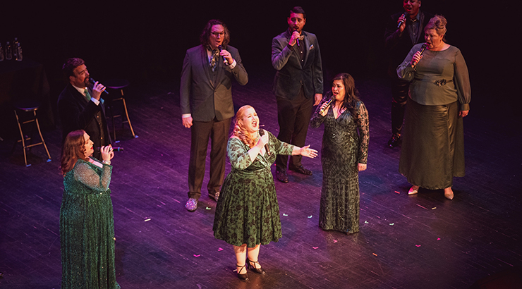 Group singing on stage