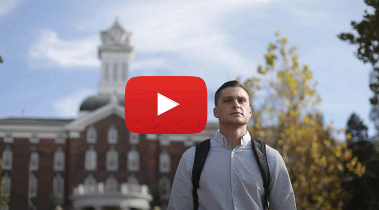 Image of a male student in front of Old Main and a white arrow in a red box indicating it is a video link