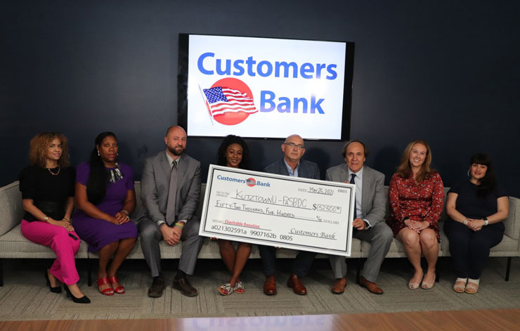 Pictured with a check presented by Customers Bank: Josephina Encarnacion, Kutztown Latino Business Resource Center (from left); Kecia Sturdivant, Kutztown University Small Business Development Center; John Stetler, Kutztown University Small Business Development Center; Sonya Smith, Pennsylvania Small Business Development Centers; Joseph Schupp, Customers Bank; Ernie Post, Pennsylvania Small Business Development Centers; Jayanne Sevast, Kutztown University Foundation; Isamac Torres-Figueroa, Kutztown University Small Business Development Center.