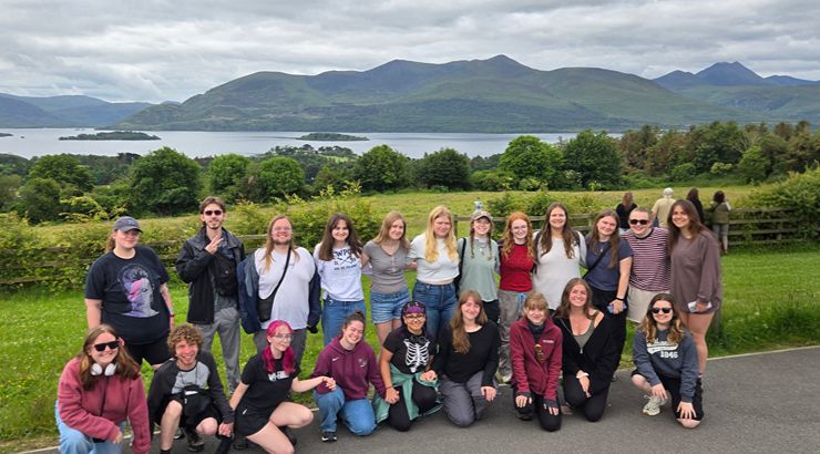 KU students in Ireland smiling and posing together for photo