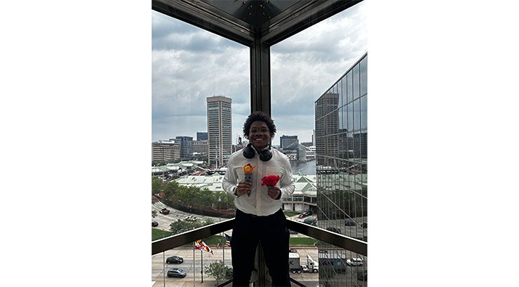 KU Student, Nathaniel Dent, in front of a