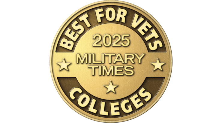 Gold circular badge with embossed text reading ‘Best for Vets 2025 Military Times Colleges,’ surrounded by small stars.