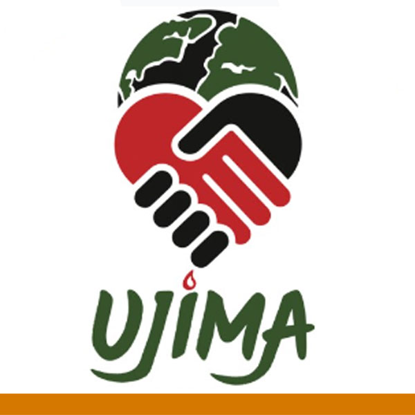 The logo of the Ujima Conference with a half of the globe and two hands interlocked in a heart shape one black and one red in color and the word Ujima in green type underneath
