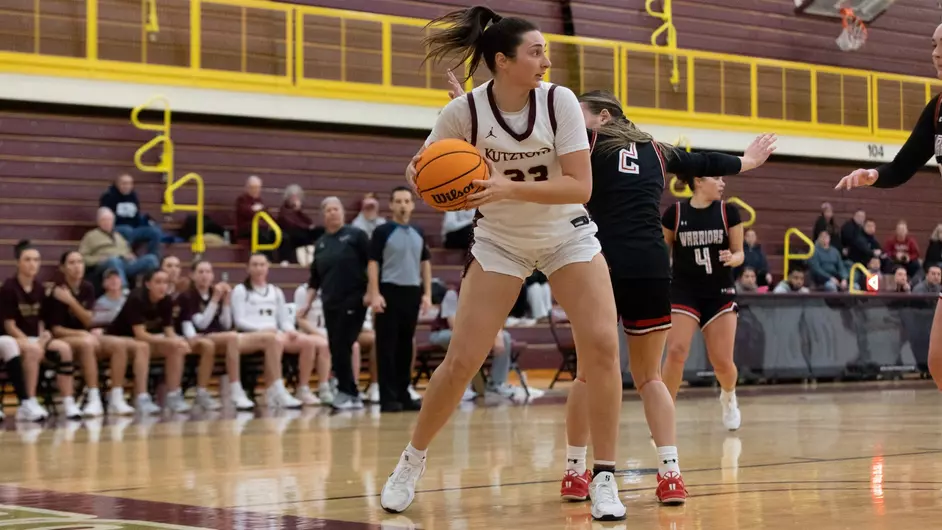 Women's basketball players in action, PSAC Quarterfinal Round, March 4