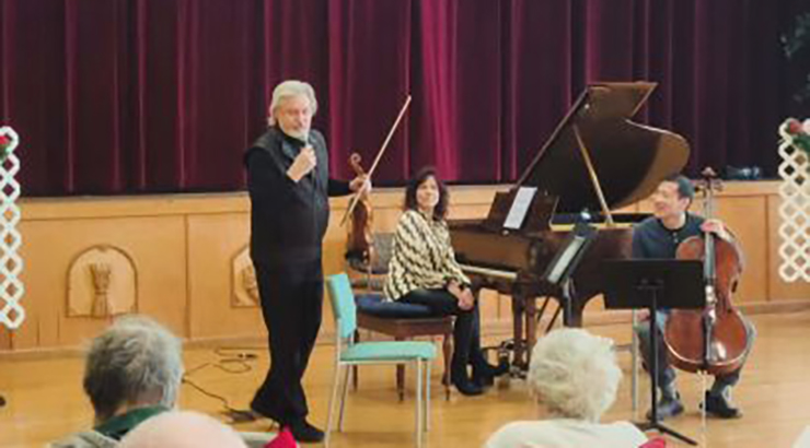 Music Faculty talking to Lutheran Home residents