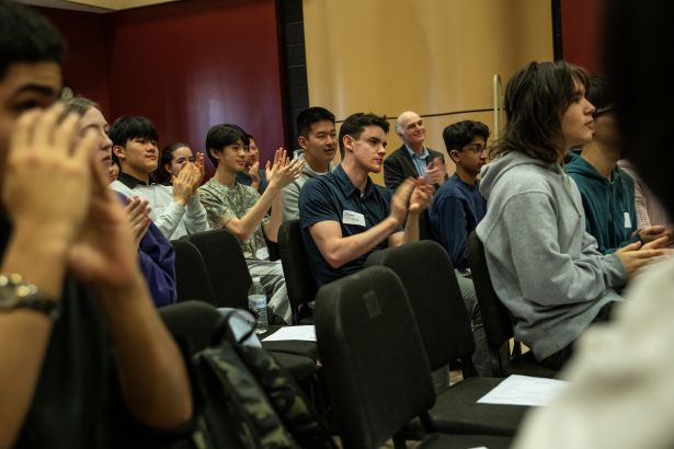 Group photo of people clapping