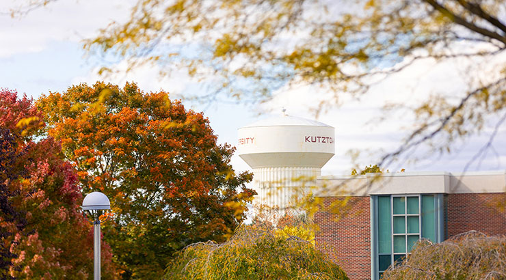 View of Kutztown Water Tower Trees with Orange and Red Leaves