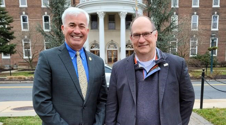 State Representative Jamie Barton and President Hawkinson in front of Old Main
