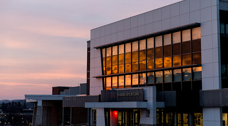Front entrance of the Sharadin Arts building at sunset 