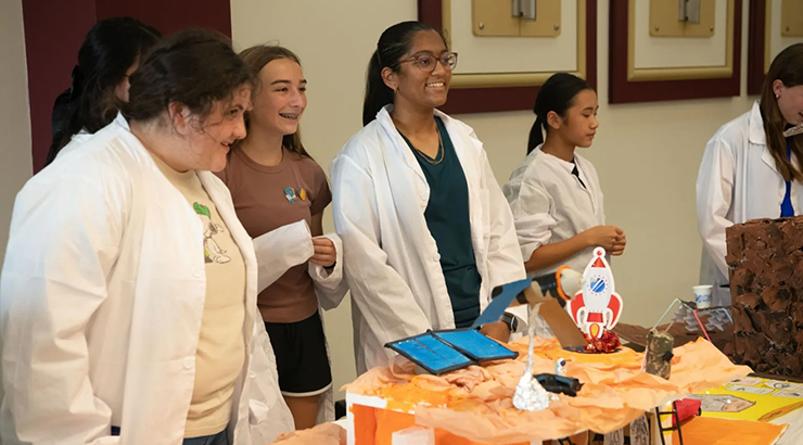 young students in lab coats