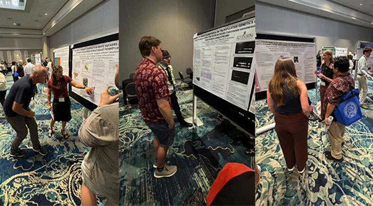 students presenting poster research