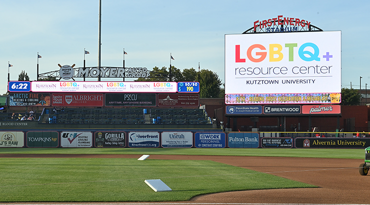 LGBTQ+ sign on billboard at ballpark