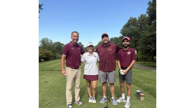 group of four on a golf course