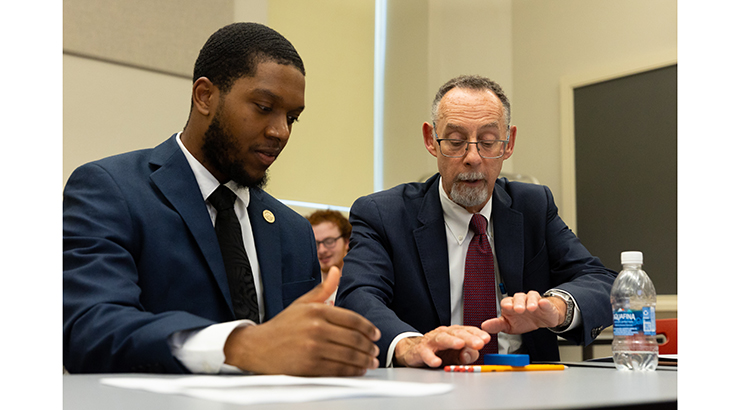 Student and Chancellor in classroom