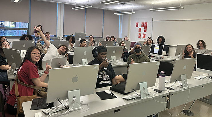 students sitting at computers in class