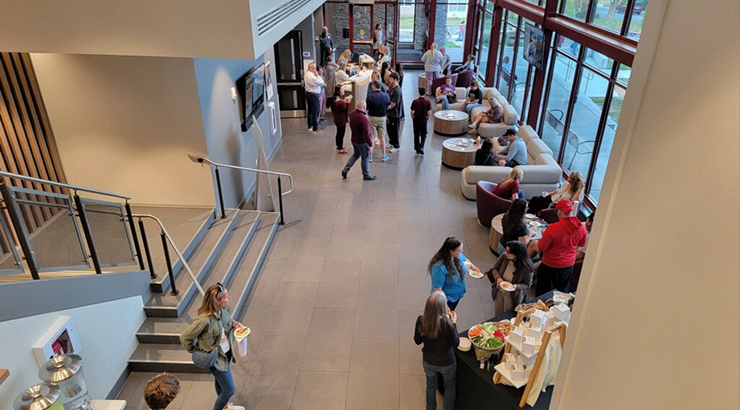 Potential students and families gathers in the Welcome Center