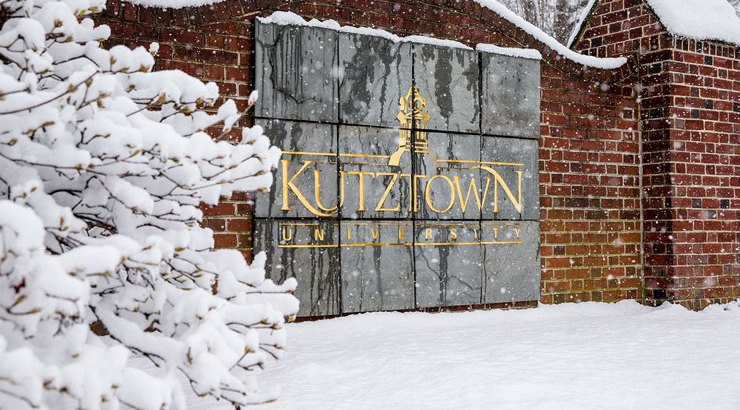 KU gate sign in the snow