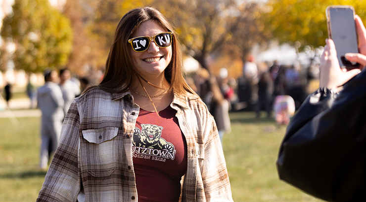 Student with I love KU sunglasses on