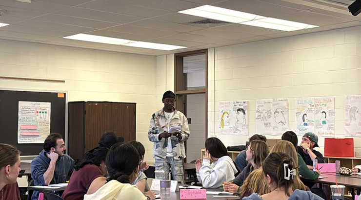 student speaking in front of a class