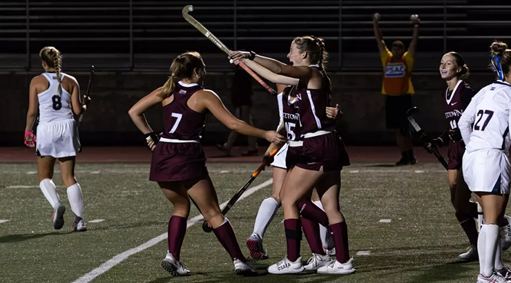 Players celebrating on field