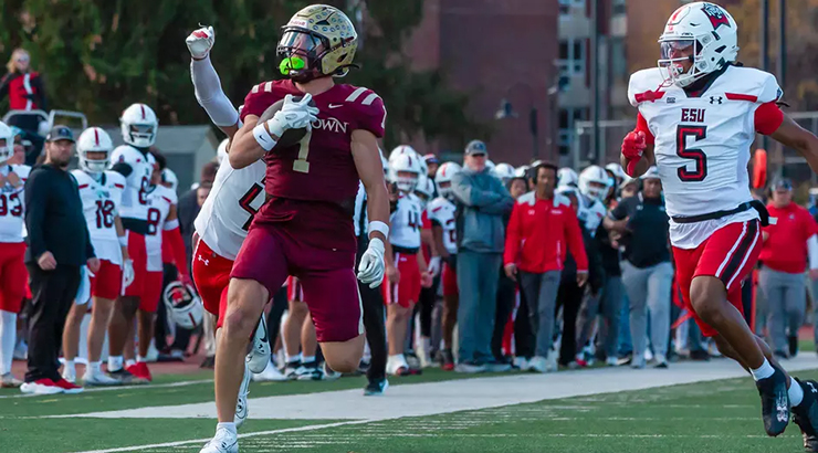 Football player running on field