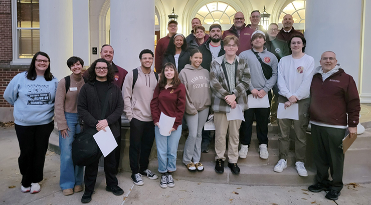 people standing on steps
