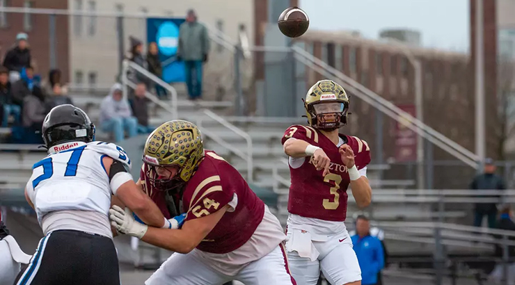 Player throwing football