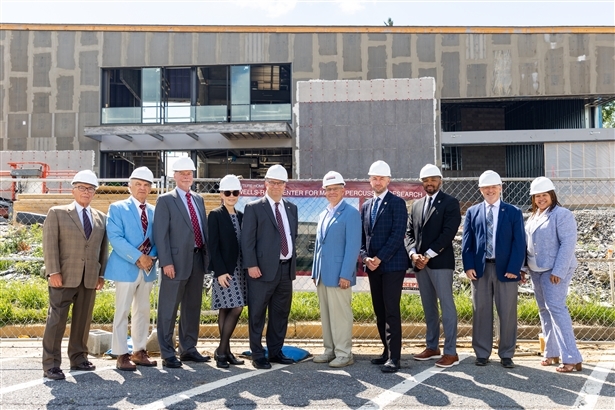 Kutztown University leadership and members of the Council of Trustees in front of the construction site of the Wells-Rapp Center for Mallet Percussion Research