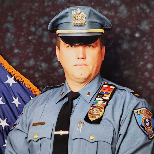 William Swanhart '03 in his Robbinsville police uniform.