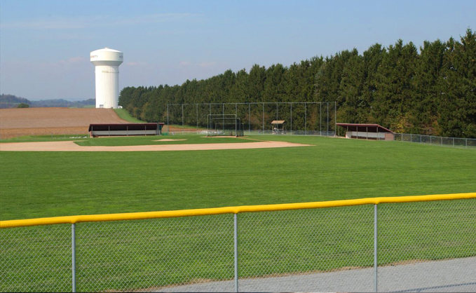 View of the empty North Campus Field from the bleachers 