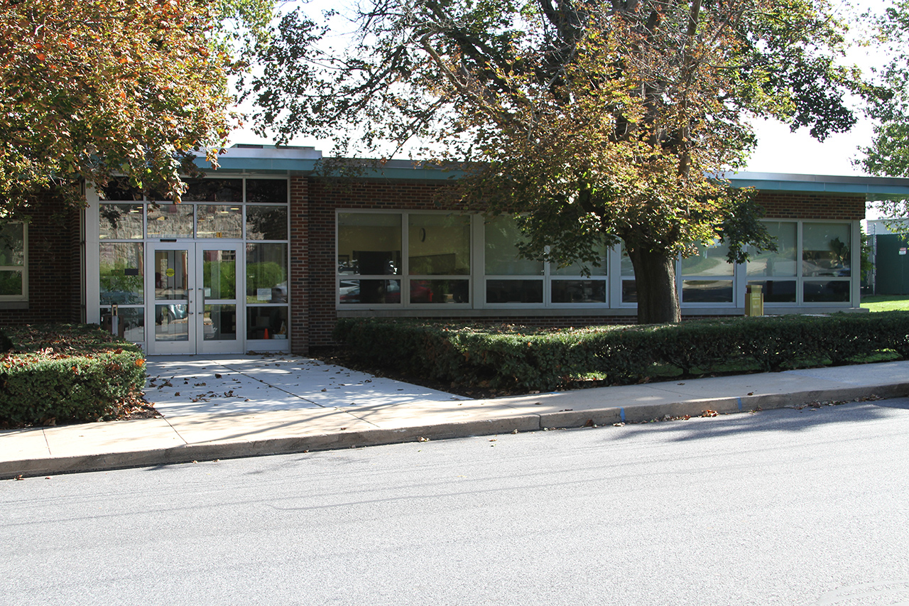 Street view of the front entrance to the Kemp Building 