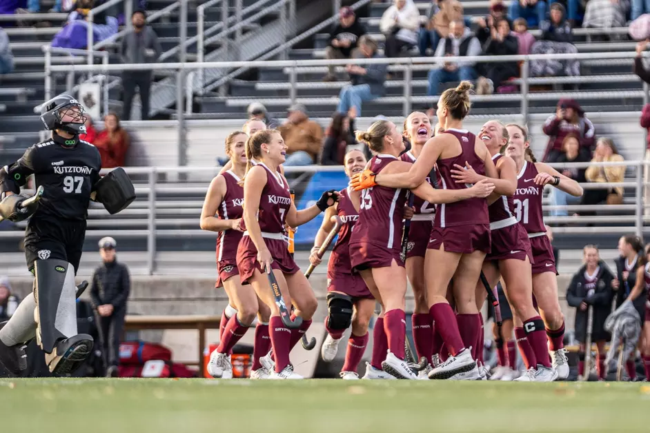 Field Hockey team celebrates.