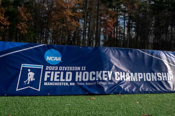 banner that reads "2023 Division II Field Hockey Championship Manchester, NH - Saint Anselm College, host"