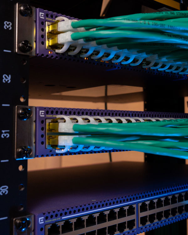 network cables plugged into a network stack