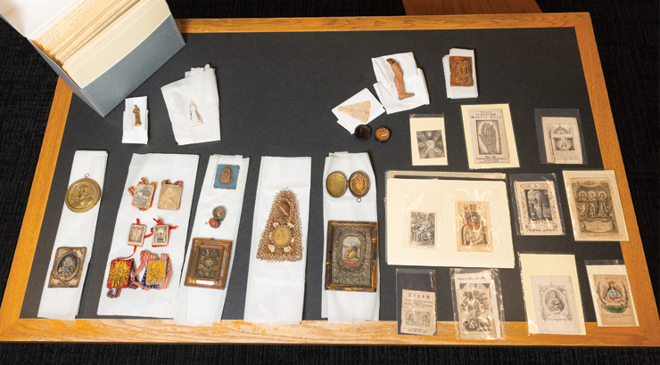 artifacts from Veneration of the Saint Display at Kutztown University's Pennsylvania German Cultural Heritage Center