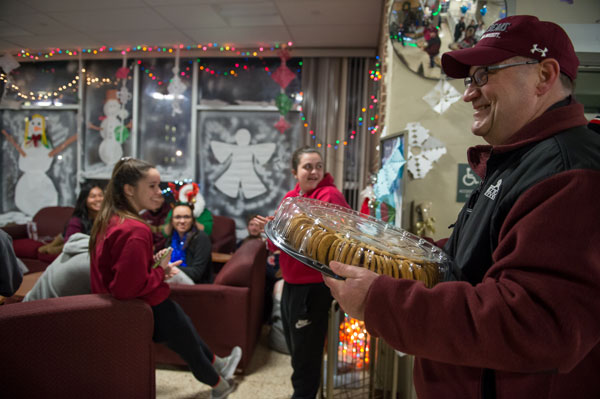 President Hawkinson delivers cookies to residence hall students