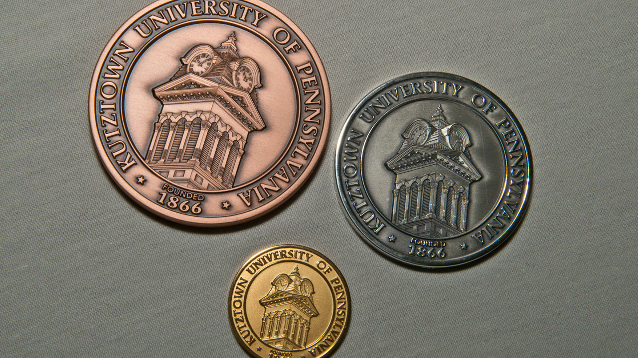 bronze, silver, and gold Chambliss award medals